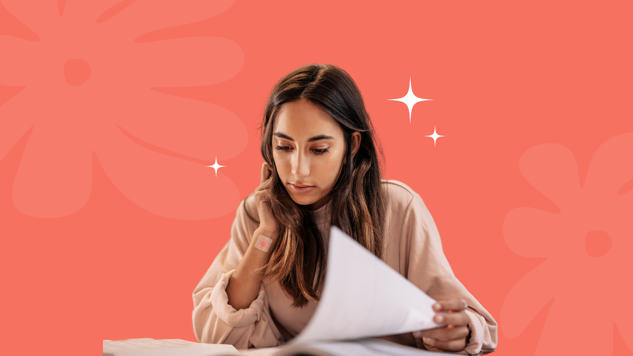 young woman studying wearing a patch love eyes on the prize focus patch on her wrist