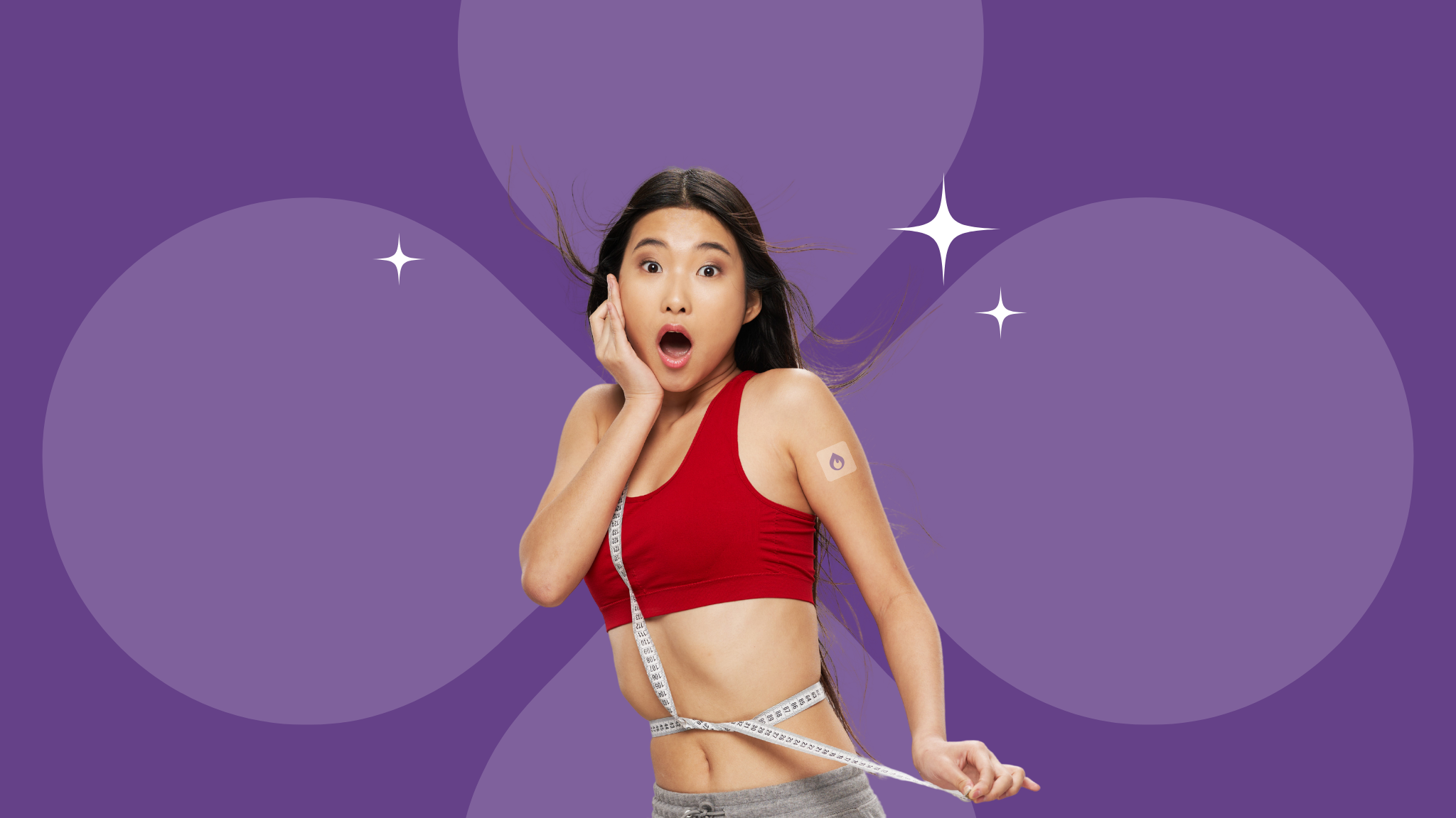 young Asian woman with surprise expression as she holds a tape measure around her waist suggesting weight loss from a metabolism boosting patch